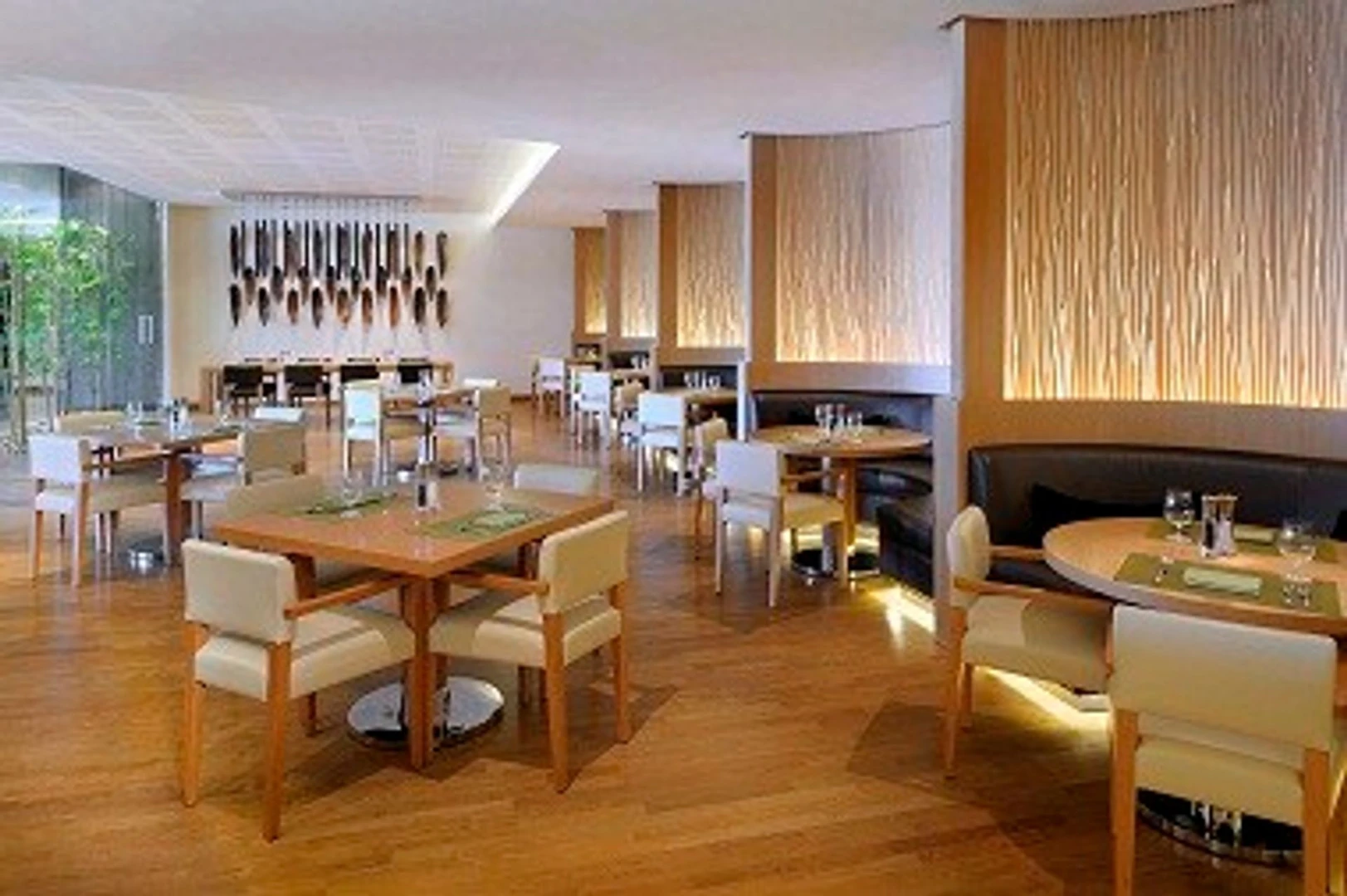 Modern dining room with wooden accents, JW Marriott Marquis Dubai.
