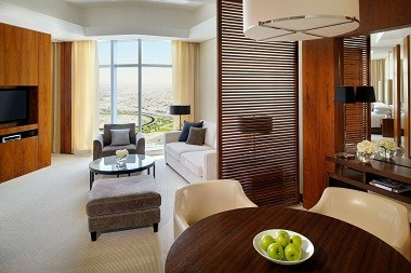 Luxurious suite at JW Marriott Marquis Hotel Dubai with city view.