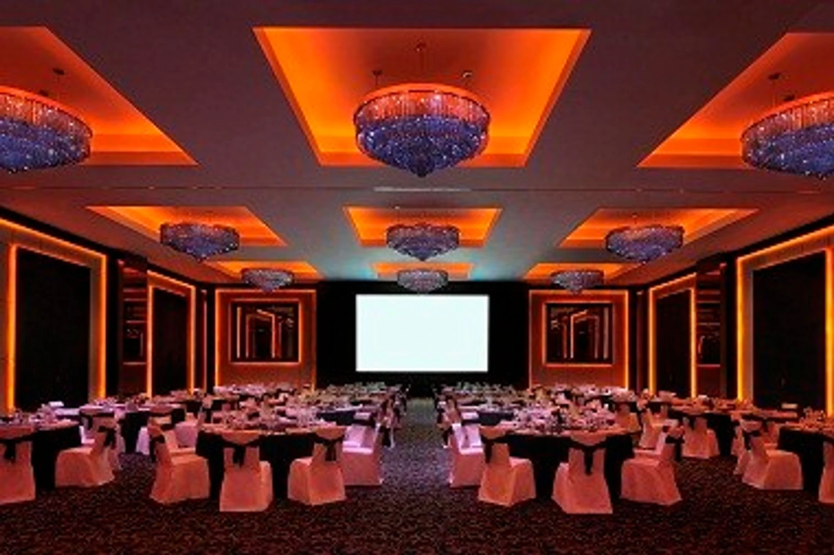 Elegant ballroom at JW Marriott Marquis Hotel Dubai with chandeliers.
