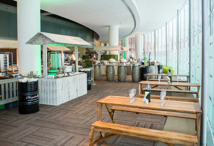 Rustic dining setup at Dubai World Trade Centre event space.