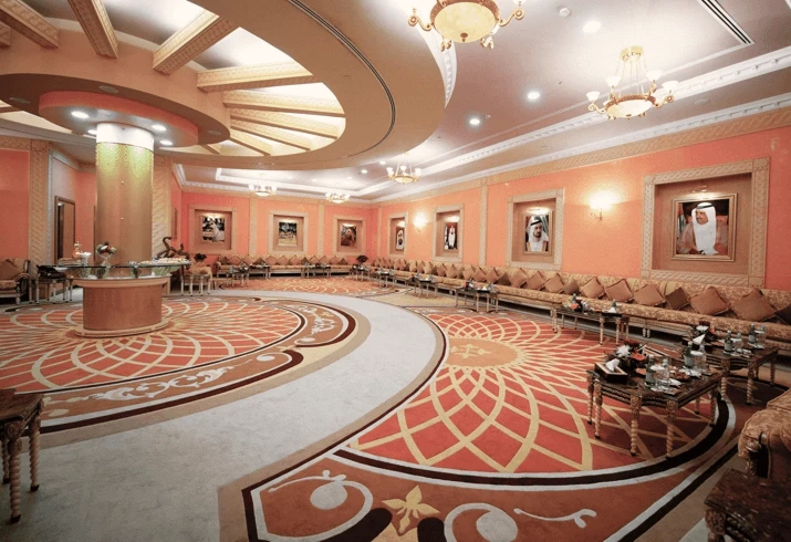 Luxurious lounge at Dubai World Trade Centre with ornate carpet design.