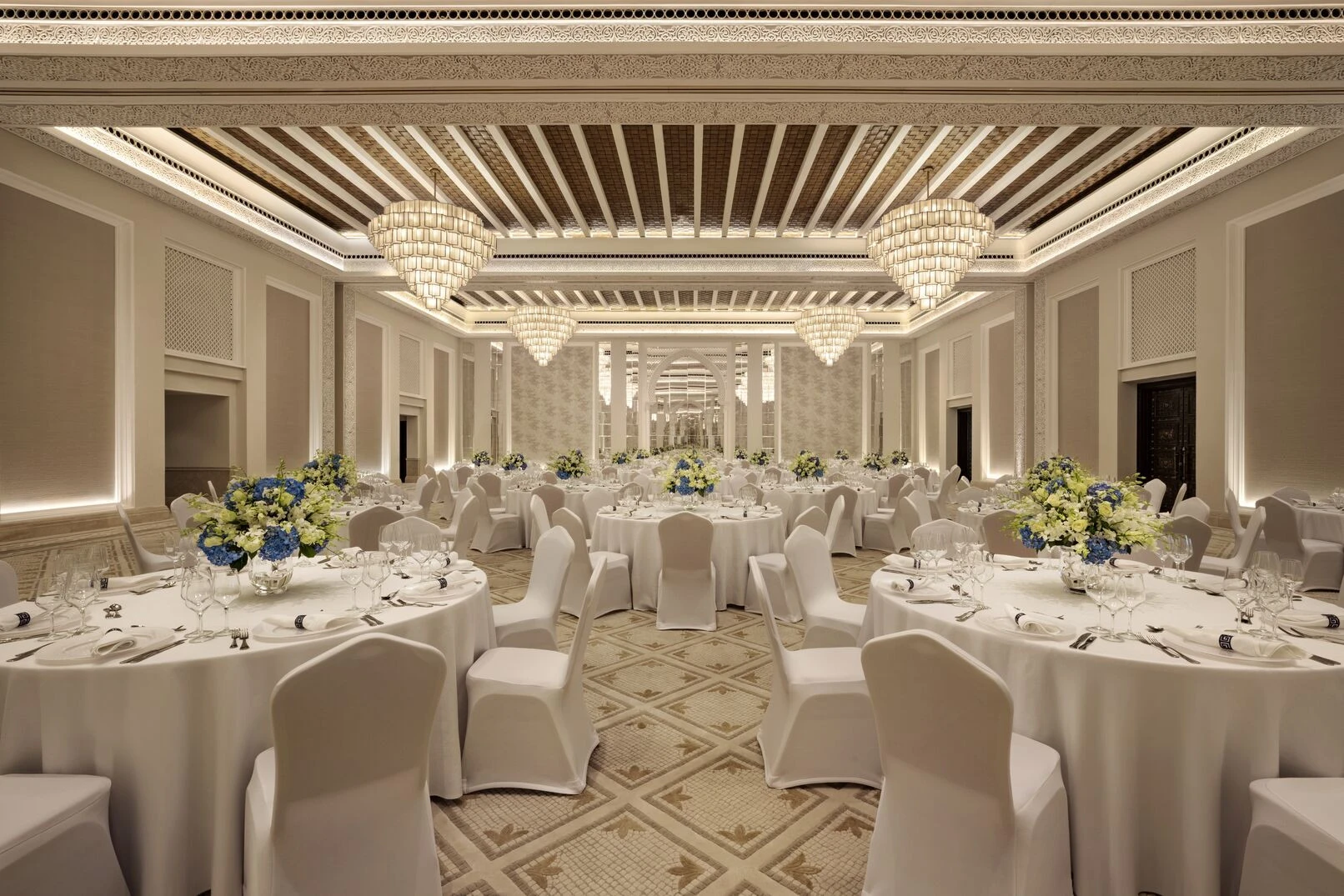 Elegant ballroom with chandeliers at Madinat Jumeirah, Dubai.