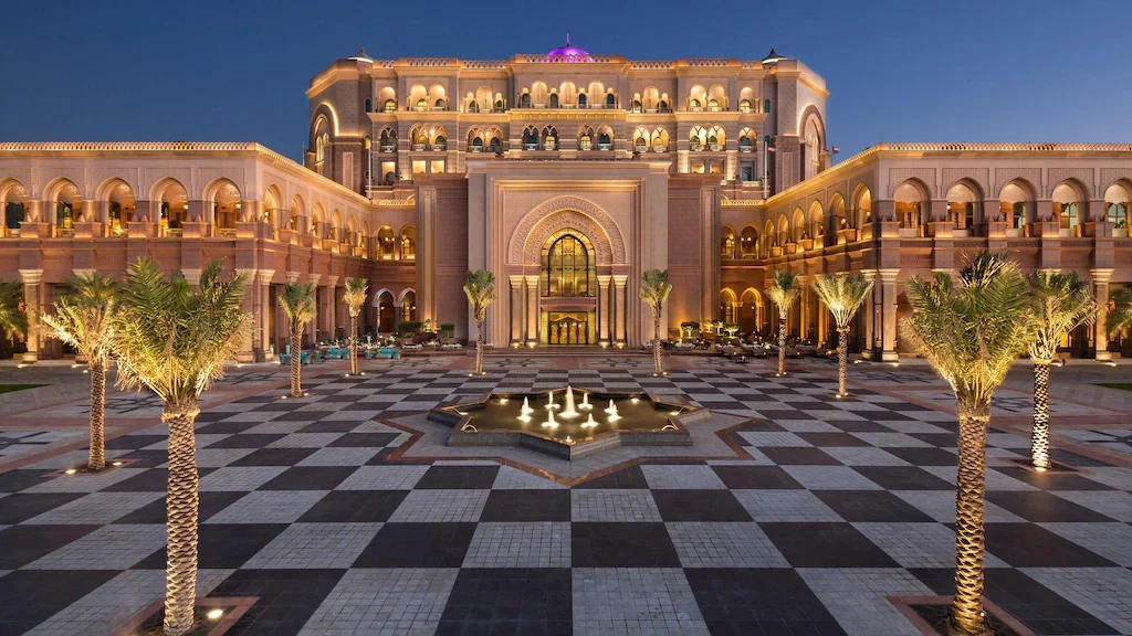 Emirates Palace Mandarin Oriental courtyard at dusk, Abu Dhabi.