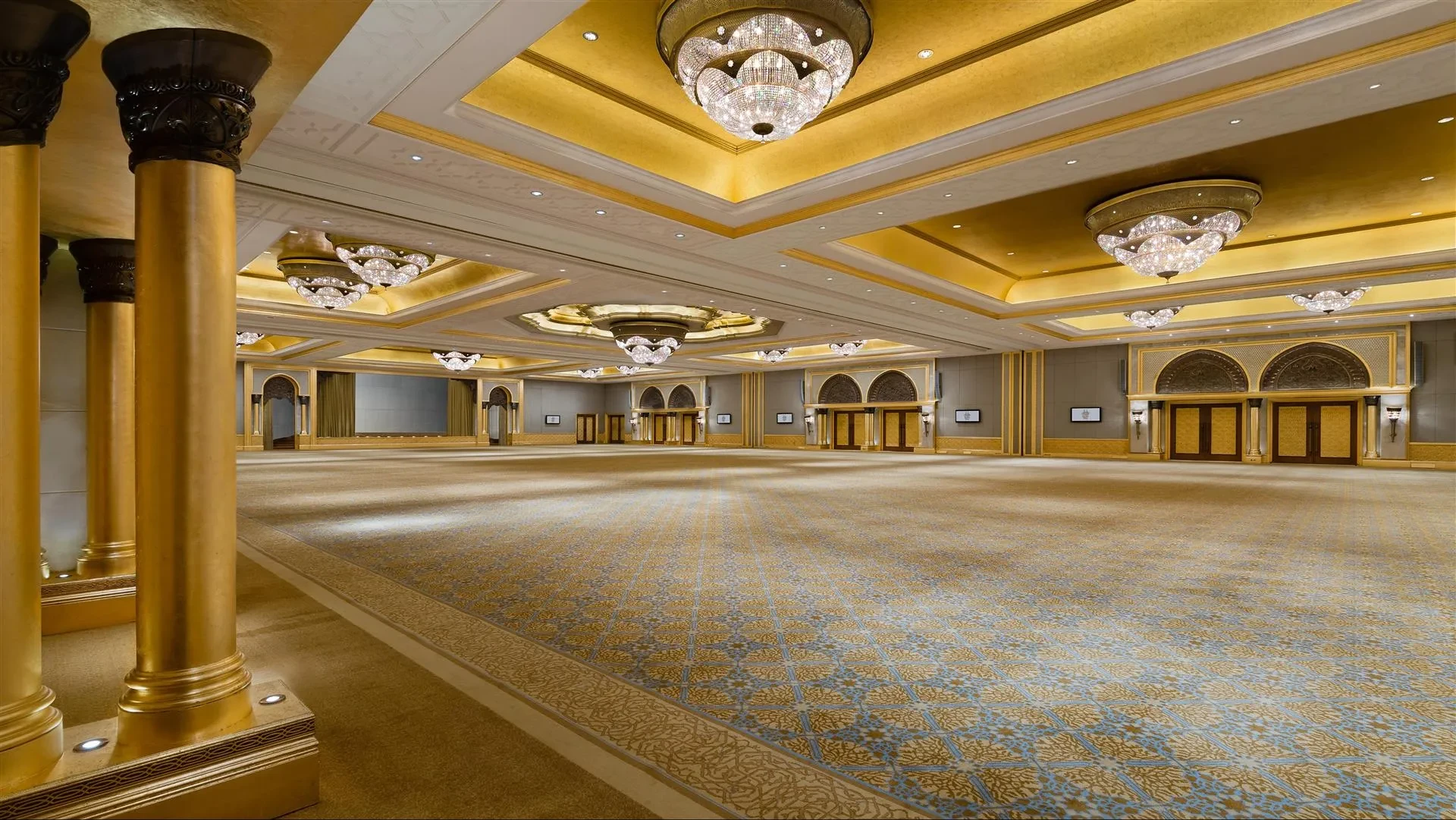 Luxurious ballroom with chandeliers at Emirates Palace Mandarin Oriental, Abu Dhabi.