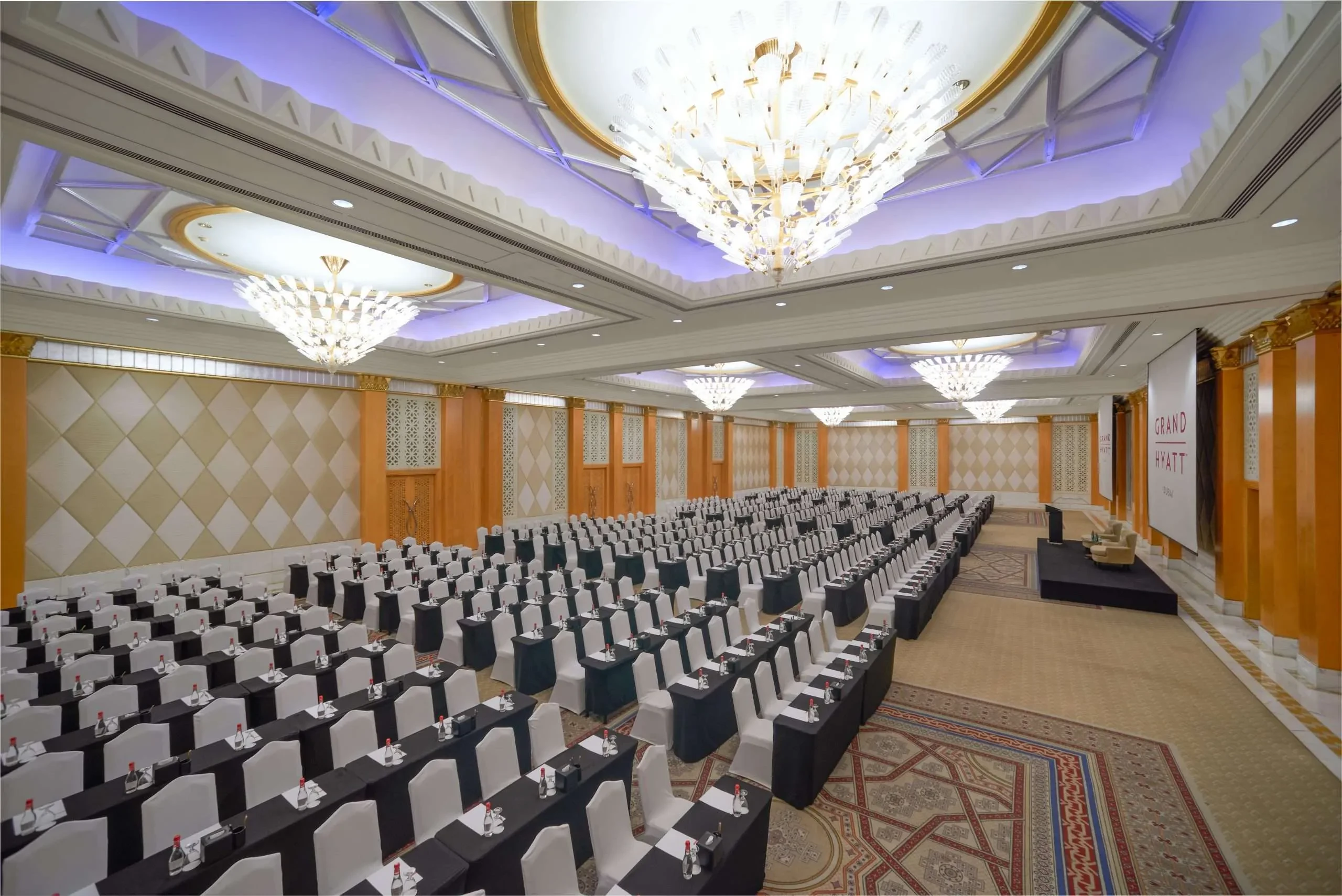 Grand Hyatt Dubai Convention Centre classroom setup with chandeliers.
