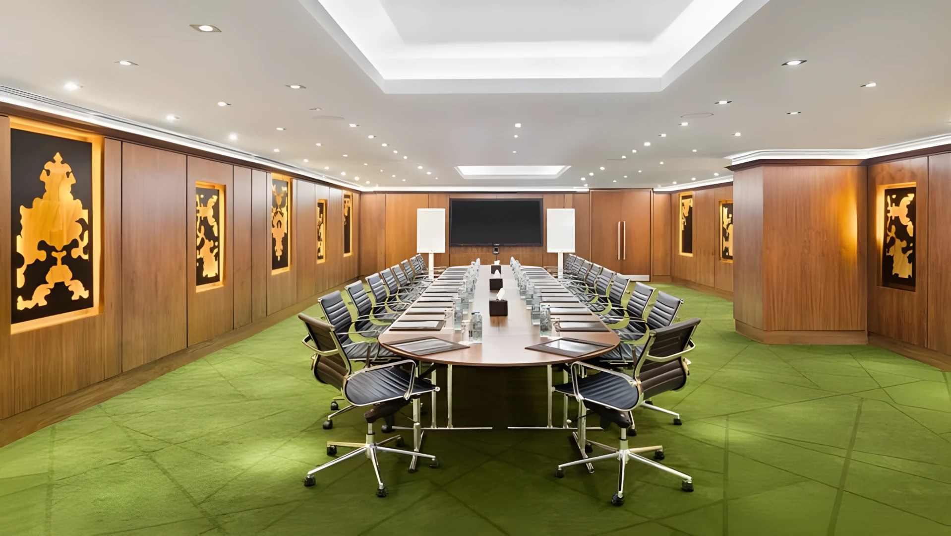 Conference room at JA Beach Hotel, Dubai, with long table and chairs.