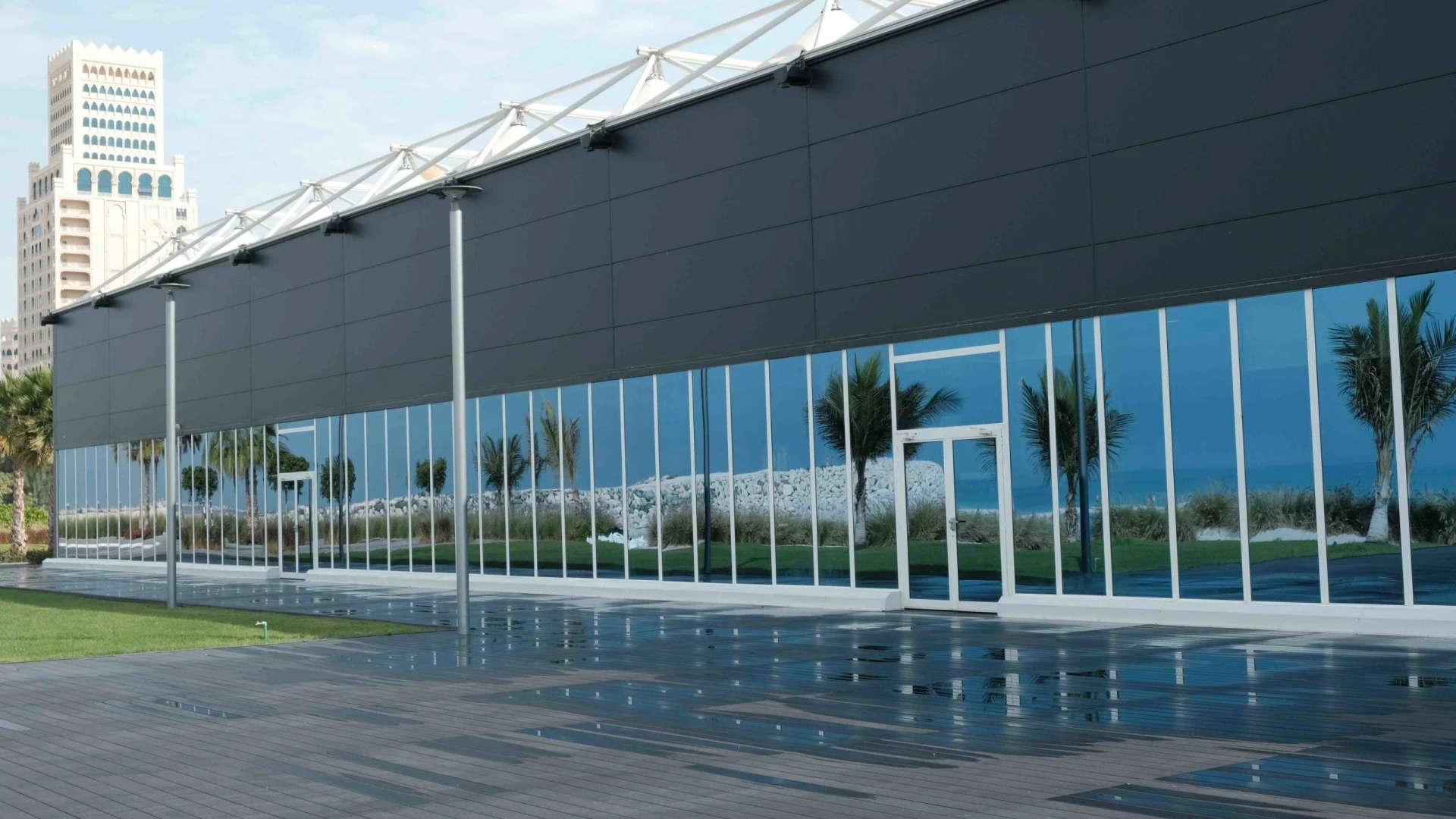 Al Hamra Conference Center exterior with glass facade, Ras Al-Khaimah.