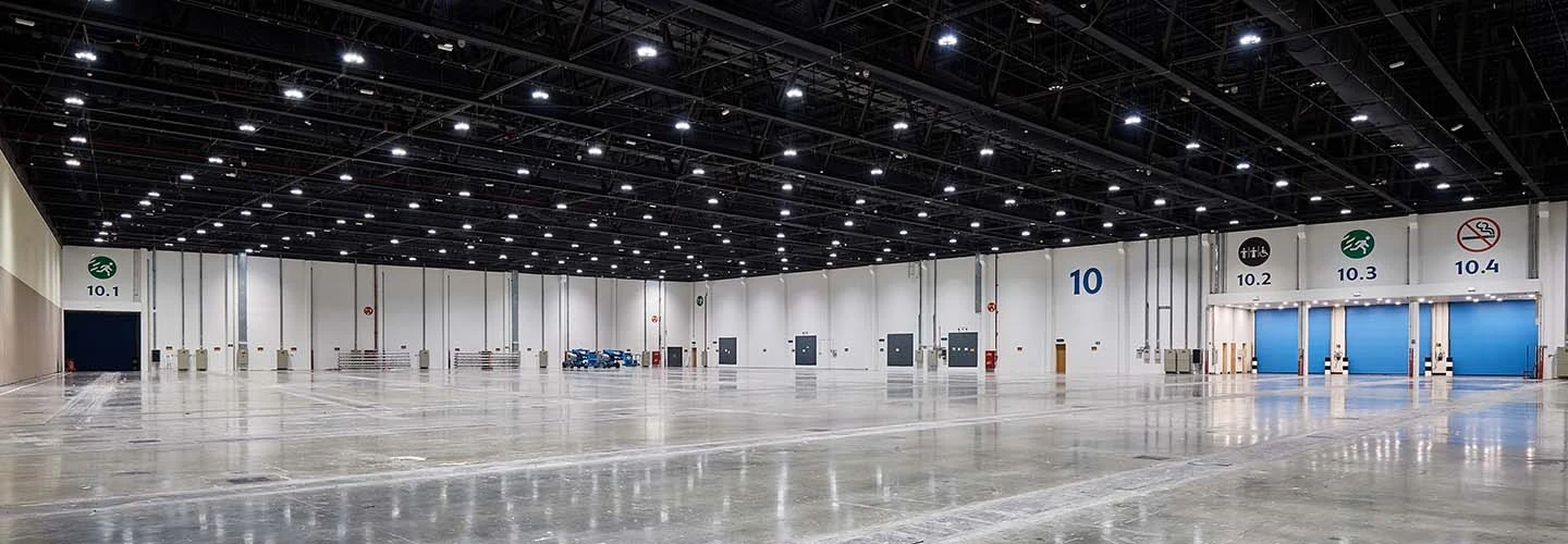 Spacious hall at ADNEC Centre Abu Dhabi, empty and well-lit.