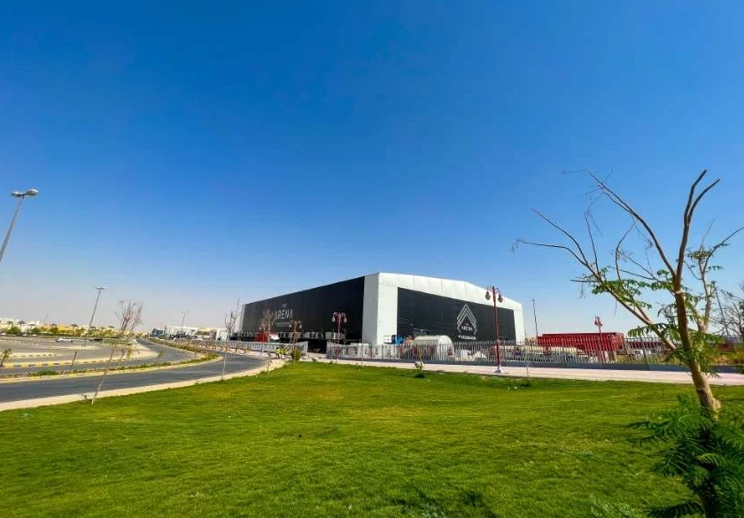 The Arena Riyadh Venue for Exhibitions, modern building, clear blue sky.